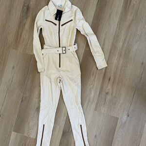 NWT fashion nova cream jumpsuit
